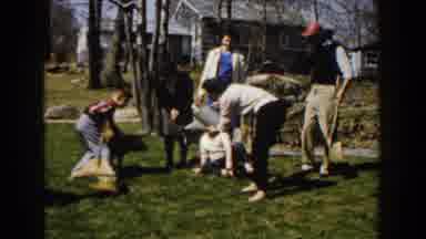 Michigan (1959): Six People And A Dog On A Lawn Girl Teases Dog With Watering Can