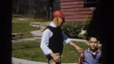 Michigan (1959): A Boy Pose In Front Of The Camera Os Others Get Busy