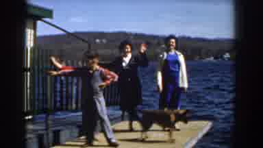 Michigan (1959): A Woman With Her Three Children And A Dog Besides The River