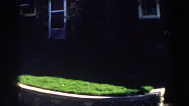 Michigan (1959): A Natural Rock Home Has A Grassy Front Lawn With A Sidewalk With