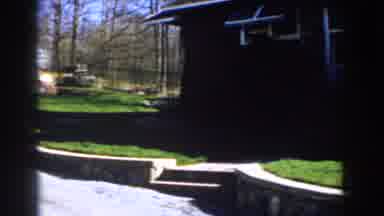 Michigan (1959): View Of Green Grass And Yellow Wooden Fence On A Sunny Day
