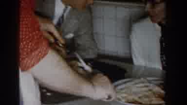 Michigan (1959): Woman Trying To Taste Turkey And Then Reprimanded By Cook