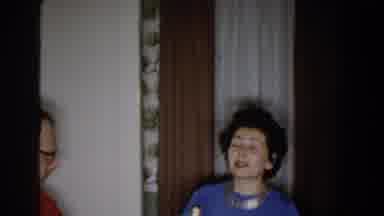Michigan (1959): Women Sitting Around A Dining Table Sing To A Man Sitting At The