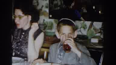 Michigan (1959): Jewish Family Having Dinner Together Drinking From Glass And Boy