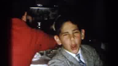 Michigan (1959): Kid Laughing In A Family Reunion In A Fancy Dinner