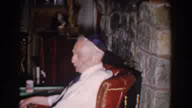 Michigan-1959: An Old Man Addresses Someone From The Comfort Of His Chair In The