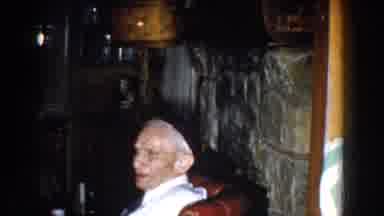 Michigan (1959): An Old Man Enjoys Himself Alone With His Newspaper In His Hands