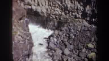 Oregon (1957): View Of River And Grey Rocks On A Sunny Day