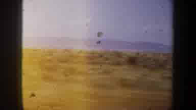 Oregon (1957): Desert Landscape Scrub Hills Mountains Sky Road View Movement Fast