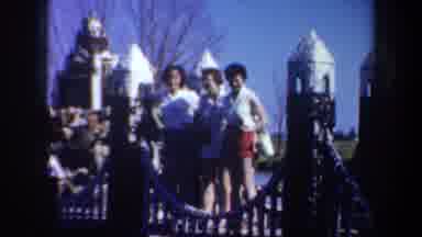 Oregon (1957): Women Standing In Front Of Very Intricate Playhouses Or Sand
