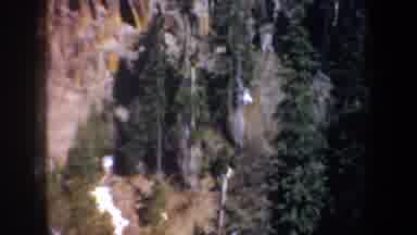 Oregon (1957): Aerial View Of A Cliff side And A Snowy Forest