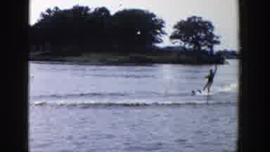 Wisconsin (1958): Man Water Skis In A Lake Then Holds His Hands Up In Joy