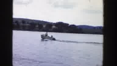 Wisconsin (1958): A Motorboat On A Lake Taking People On A Rope And Someone