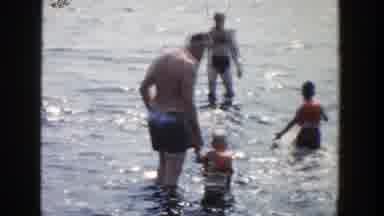 Wisconsin (1958): Kids And Grown Ups Playing In The Water Adorable Adult Holding
