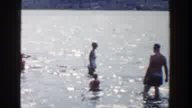Wisconsin (1958): A Man Monitored The Kids Having Their Bath In The River
