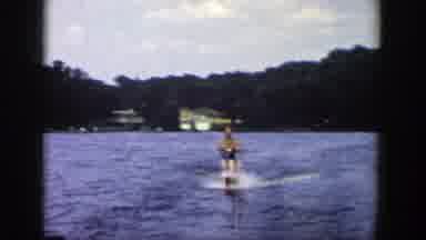 Wisconsin (1958): Person Wearing Black Shorts Water skis On A Clear Sunny Day
