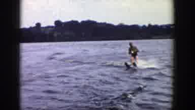 Wisconsin (1958): People Out On Lake Or Beach Riding On Skies I Would Say