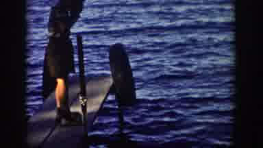 Wisconsin (1958): Person Catching A Fish While Standing On A Dock Then Showing It