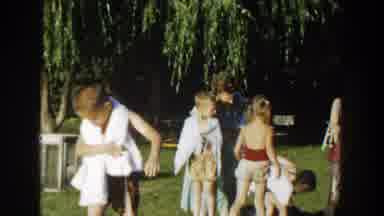 Wisconsin (1958): A Group Of People During The Picnic In Meadow With Many Trees