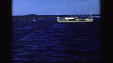 Wisconsin (1958): Family Picnic And Boat Floating In A Harbor In Classic Archival