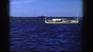Wisconsin (1958): I See The Sea Or A River With A Stationary Boat And The Coast At