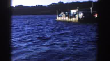 Wisconsin (1958): Floating Car-Boat Filmed During A Sunny Day With A City On A