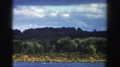 Wisconsin (1958): A Large River Where People Go Fishing On Sunny Days