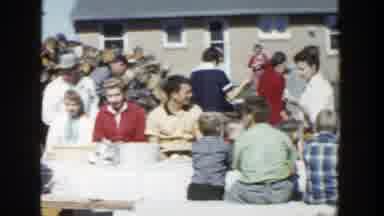 Wisconsin (1958): View Of People Eating At Large White Outdoor Picnic Table On A