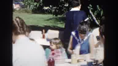 Wisconsin (1958): A Woman Feeding The Hungry Kids In The Open During Camping