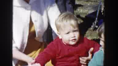 Wisconsin (1958): The Baby Plays With His Mother As His Dad Entertains Them Both