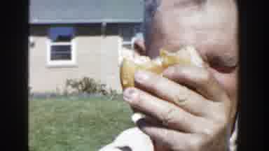 Wisconsin (1958): Father Eats A Roasted Beef Sandwich While Talking In Front Of A