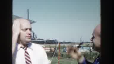 Wisconsin (1958): Bald Men Touching Their Head And Man Playing With Hula-Hoop