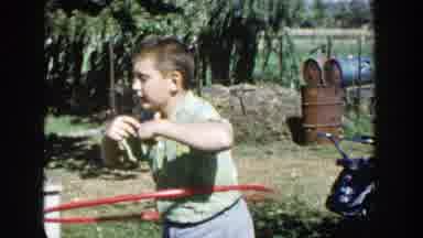 Wisconsin (1958): Little Boy Playing With Hula Hoop While The Other One Plays With