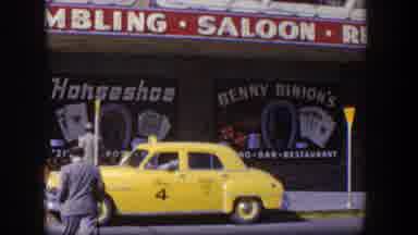 Las Vegas Nevada (1954): Men Crossing The Road Opposite A Gambling Saloon Shop