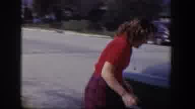 Las Vegas Nevada (1954): A Lady Picks A Ball From Under A Parked Car And Throw It