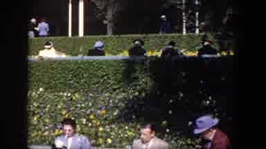Las Vegas Nevada (1954): Suited Pedestrians Sitting On Public Benches And Enjoying