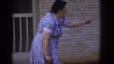Las Vegas Nevada (1954): An Old Woman Climbs Down A Staircase Holding A Stick