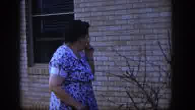 Las Vegas Nevada (1954): Elderly Woman In White And Blue Print Dress Looks At