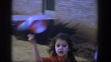 Las Vegas Nevada (1954): Small Girl Running In Front Of An Old Lady Waving Her Cap