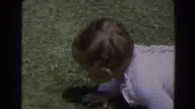 North Hollywood California (1964): Curly Haired Child Wearing White Clothes