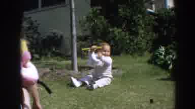 North Hollywood California (1964): Two Children Of Varying Ages Laying In The