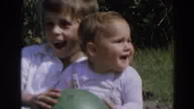 North Hollywood California (1964): A Boy Kisses His Younger One As They Play With