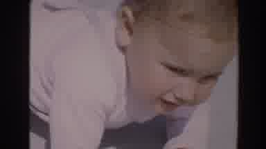 North Hollywood California (1964): A Cute Blond Smiling Baby Crawling And Playing