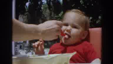 North Hollywood California (1964): Blonde Baby Boy Is Spoon Fed His Breakfast In