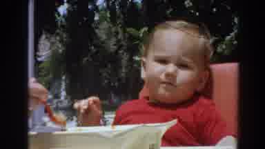 North Hollywood California (1964): Persons Hand Feeds Child With Spoon Child