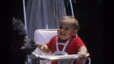 North Hollywood California (1964): Happy Infant Wearing A Red Shirt Sitting In A