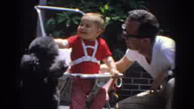 North Hollywood California (1964): Toddler Wearing Red Shirt Sits In White Baby