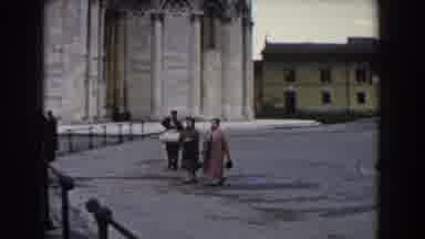 Pisa Italy (1959): Two Women Walking Hand-in-Hand Waiting For A Taxi