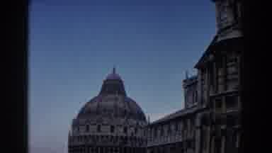 Pisa Italy (1959): People Walk In Front Of Multiple Story Ornate White Building