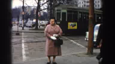 Pisa Italy (1959): A Woman In Jacket And Hand Gloves Talks To Someone Across The
